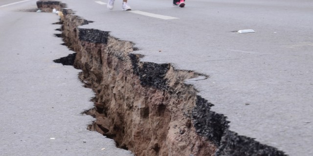 A Fault Line: That's where the crust's tectonic plates 'break' occurs.