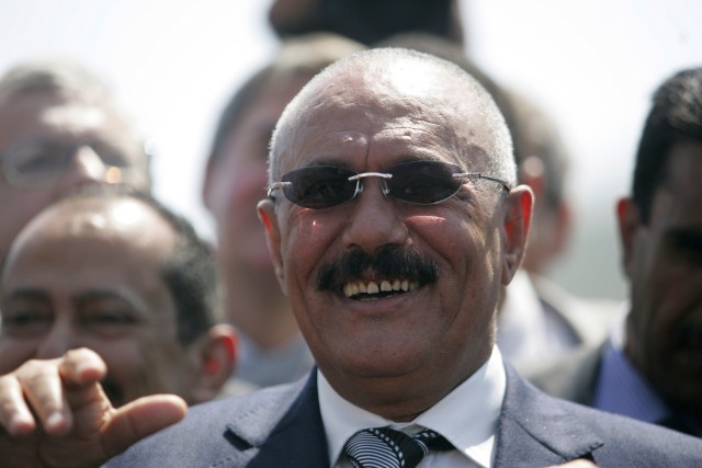 Yemeni President Ali Abdullah Saleh looks on after inaugurating the liquefied natural gas (LNG) plant in the southeastern port of Balhaf November 7, 2009. Yemen dispatched its first liquefied natural gas (LNG) shipment on Saturday from a $4.5 billion Total-led plant, as the leader of the violence-torn country sought to soothe security concerns. The first shipment left the export terminal at Belhaf for South Korea aboard a Korean tanker, carrying around 149,000 cubic metres of LNG. REUTERS/Khaled Abdullah (YEMEN POLITICS CONFLICT ENERGY BUSINESS)