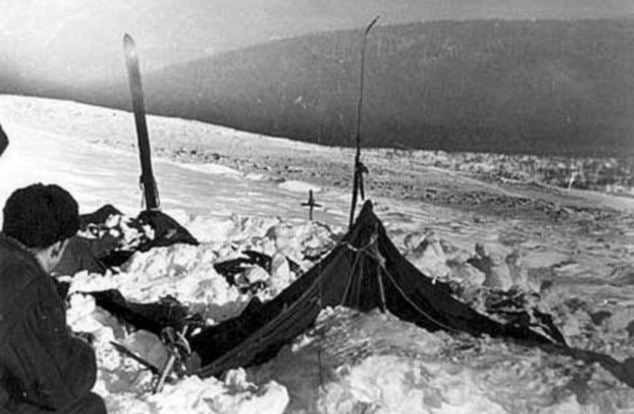A view of the tent as the rescuers found it on Feb. 26, 1959. The tent had been cut open from inside, and most of the skiers had fled in socks or barefoot. Photo taken by soviet authorities at the camp of the Dyatlov Pass incident and anexed to the legal inquest that investigated the deaths.