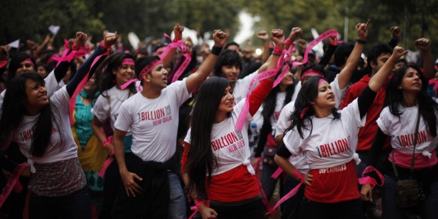 Activists dance in an event to support "One Billion Rising" global campaign in New Delhi, India, Thursday, Feb. 14, 2013. Flashmobs and rallies with singing and dancing were organized across the country as part of the campaign, timed to coincide with Valentine's Day, to bring an end to violence against women. (AP Photo/Altaf Qadri)