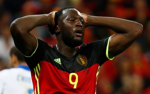 Lukaku reacts after missing his chance at goal