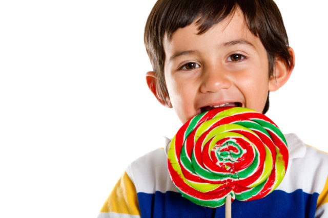 Kid eating candy