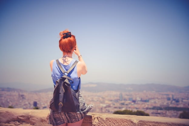 city-woman-view-blue-sky-624x416