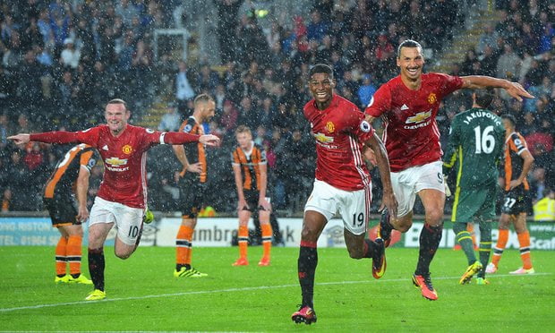 Marcus Rashford celebrates as Manchester United win the stoppage time to continue their Premier League revival.