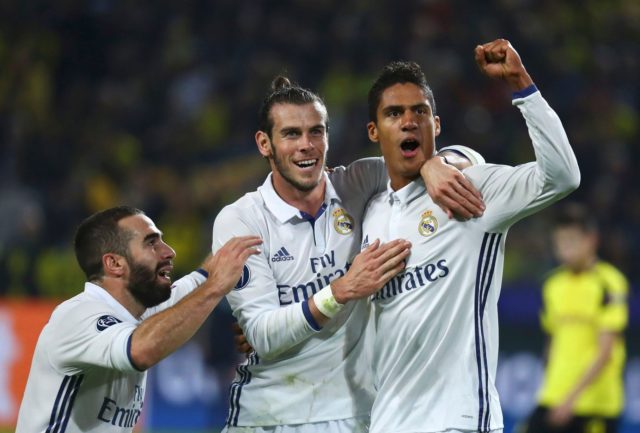 Raphael Balance celebrates after restoring Real Madrid's lead.
