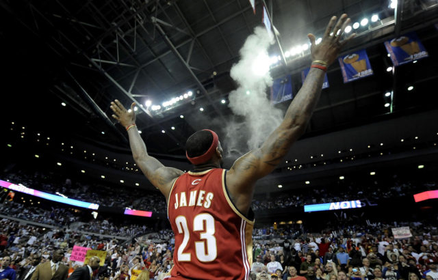 LeBron James doing the "Chalk Toss", his pre-game ritual.