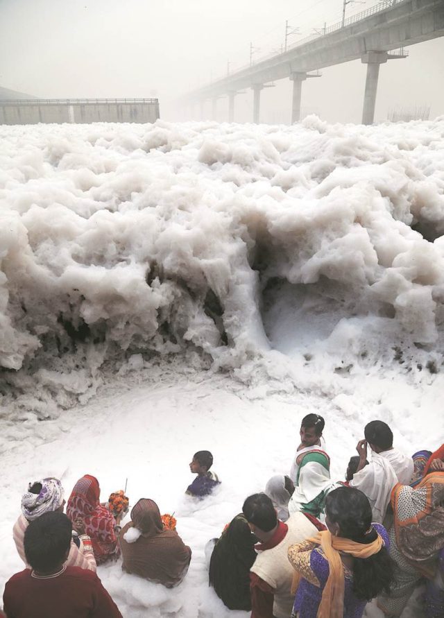 People celevrating Chatth puja at Yamuna near kalindi Kunj, The Yamuna is pollutesd toa the level of surf and the people is already suffering with the air pollution. Express Photo by Abhinav Saha. November 11, 2016.