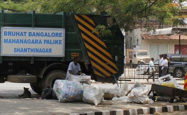 Bengaluru scam: A BBMP truck collecting garbage in the street