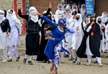 women stone pelting in kashmir