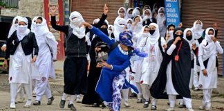 women stone pelting in kashmir