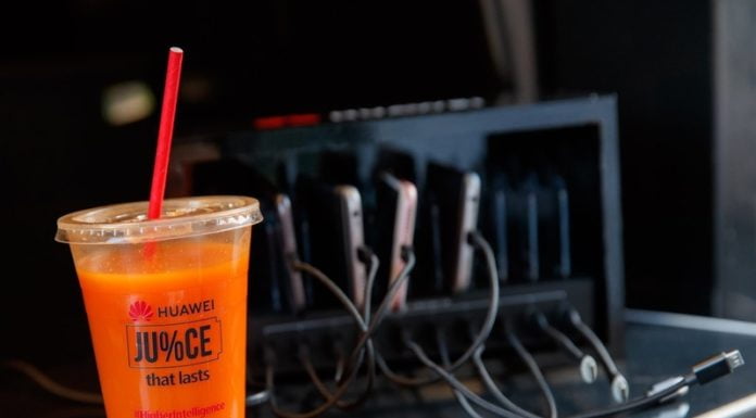 In Pics: How Huawei Trolled Apple By Distributing Power Banks And Juice To Queue Standing Outside Apple Stores Huawei Trolled Apple