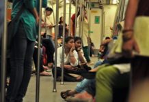 This Is Why Commuters Are Fined For Sitting On The Floor Of Delhi Metro