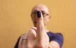 a-malaysian-voter-shows-his-ink-stained-finger-after-casting-his-ballot-outside-a-polling-station-in-kuala-lumpur-on-may-5-2013