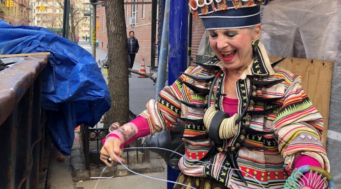 In Pics: Woman Turns Garbage Into High End Fashionable Hats And Wears It Herself