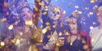 friends-in-halloween-costumes-dancing-among-royalty-free-image-995528734-1539637285