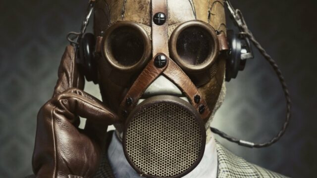 A conceptual image of a man wearing a gas mask to protect himself from toxicity