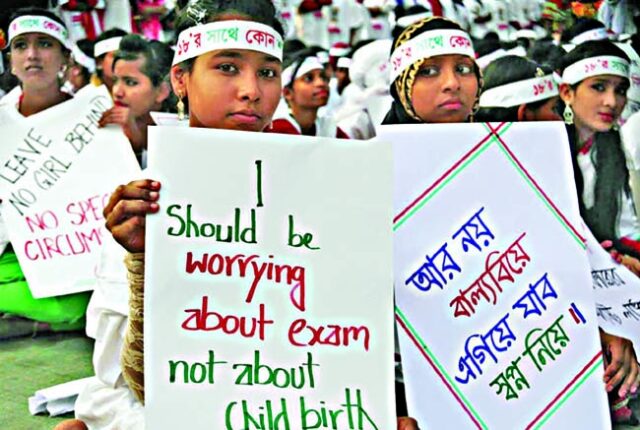 Protests against child marriage is common around the world. In this picture two girls are holding placards and raising their voice against child marriage.
