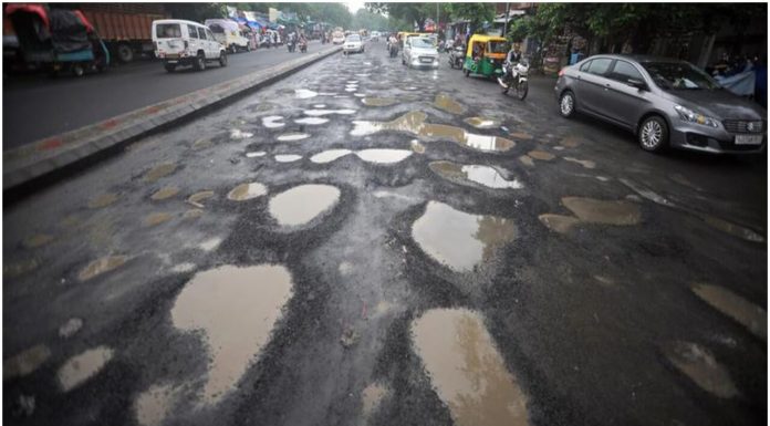 In Pics: The Story Of A Mumbai Man Who Fills Potholes On The Road In The Memory Of His Son potholes